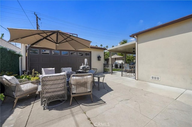 1361 Winchester Ave, Glendale, CA 91201 - view of patio with outdoor dining area and a garage