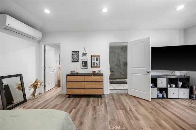 1361 Winchester Ave, Glendale, CA 91201 - bedroom featuring a wall unit AC, light wood-style floors, recessed lighting, and ensuite bathroom