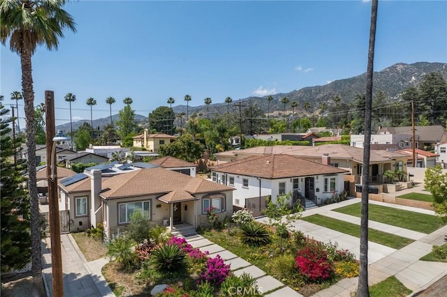 1361 Winchester Ave, Glendale, CA 91201 - mediterranean / spanish home featuring a residential view, a mountain view, and stucco siding