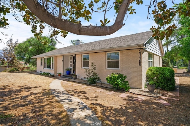 31189 Alta Vista Dr, Redlands, CA 92373 - ranch-style home featuring brick siding and a chimney