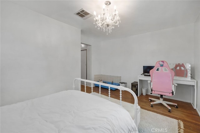 31189 Alta Vista Dr, Redlands, CA 92373 - bedroom with wood finished floors and a chandelier