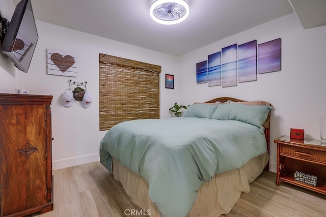 9171 Heatherton Cir, Huntington Beach, CA 92646 - bedroom featuring wood finished floors and baseboards