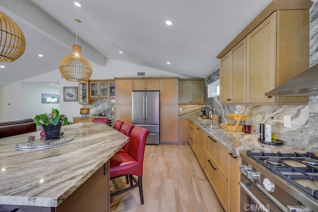 9171 Heatherton Cir, Huntington Beach, CA 92646 - kitchen with stainless steel appliances, vaulted ceiling, wall chimney exhaust hood, tasteful backsplash, and light wood finished floors