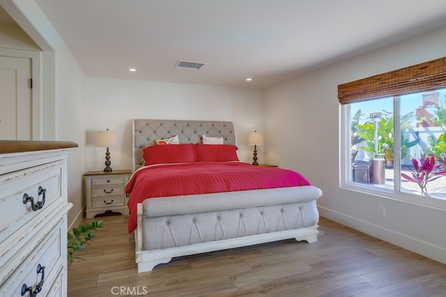 9171 Heatherton Cir, Huntington Beach, CA 92646 - bedroom with light wood-style floors, baseboards, and recessed lighting