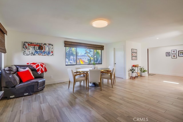 9171 Heatherton Cir, Huntington Beach, CA 92646 - dining room featuring light wood-style floors and baseboards