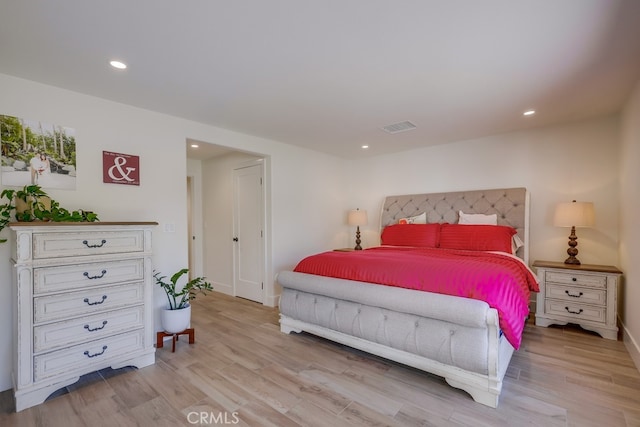 9171 Heatherton Cir, Huntington Beach, CA 92646 - bedroom with light wood-type flooring, recessed lighting, and baseboards