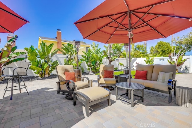 9171 Heatherton Cir, Huntington Beach, CA 92646 - fenced backyard with an outdoor living space and a patio