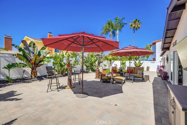 9171 Heatherton Cir, Huntington Beach, CA 92646 - fenced backyard featuring a patio and an outdoor living space