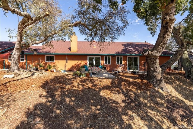 10755 Santa Ana Rd, Atascadero, CA 93422 - back of property with a patio and a chimney