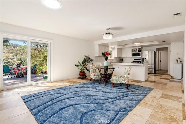 10755 Santa Ana Rd, Atascadero, CA 93422 - living room with light tile patterned floors and baseboards