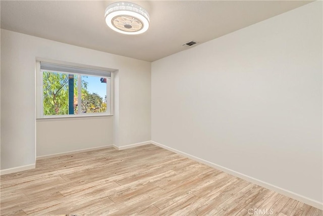 10755 Santa Ana Rd, Atascadero, CA 93422 - unfurnished room with wood finished floors and baseboards