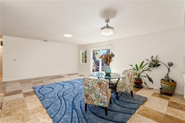 10755 Santa Ana Rd, Atascadero, CA 93422 - dining area featuring light tile patterned floors and baseboards