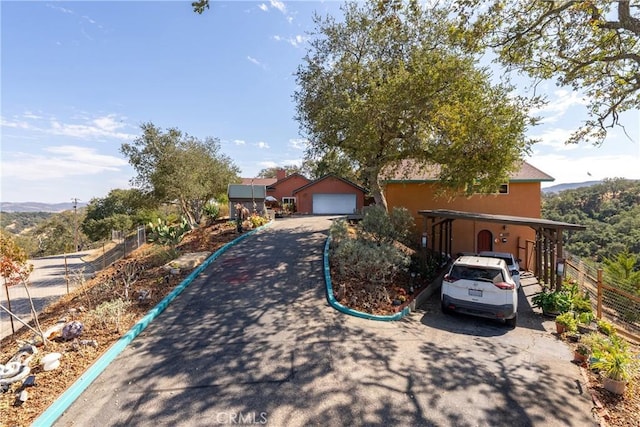 10755 Santa Ana Rd, Atascadero, CA 93422 - view of front of property with driveway, a garage, and stucco siding