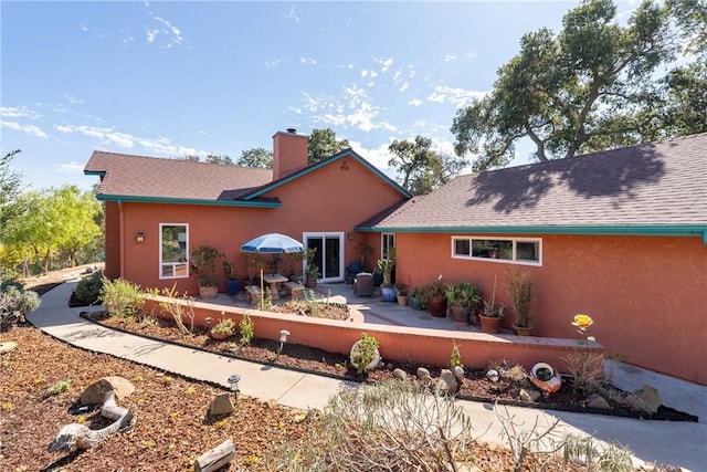 10755 Santa Ana Rd, Atascadero, CA 93422 - rear view of property with a chimney, a patio, and stucco siding