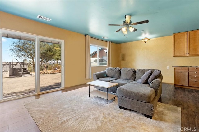 10755 Santa Ana Rd, Atascadero, CA 93422 - living area with a ceiling fan and wood finished floors