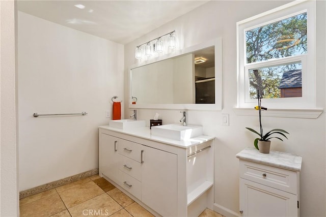 10755 Santa Ana Rd, Atascadero, CA 93422 - bathroom with double vanity, baseboards, and tile patterned flooring