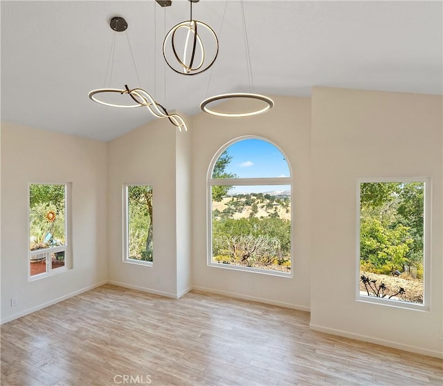 10755 Santa Ana Rd, Atascadero, CA 93422 - spare room featuring healthy amount of natural light, wood finished floors, and baseboards