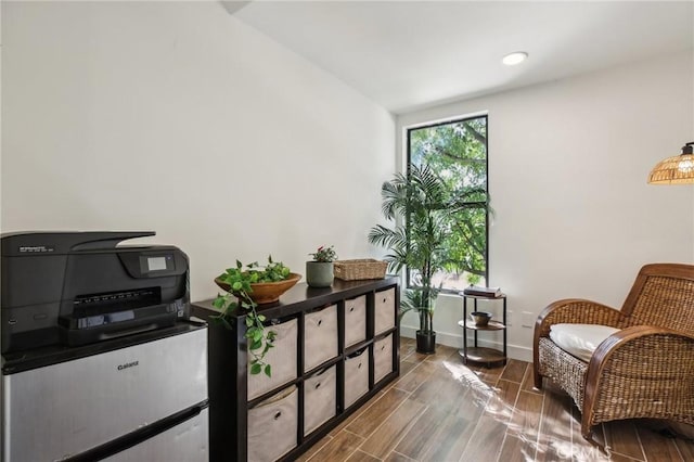 25761 Le Parc Unit 89, Lake Forest, CA 92630 - sitting room with dark wood finished floors and baseboards