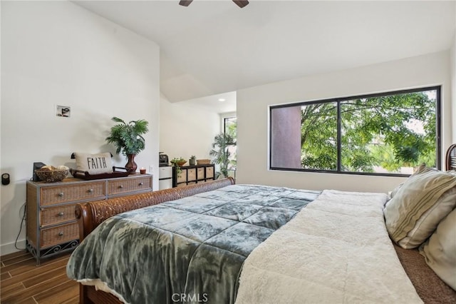 25761 Le Parc Unit 89, Lake Forest, CA 92630 - bedroom with lofted ceiling, dark wood-style flooring, baseboards, and a ceiling fan