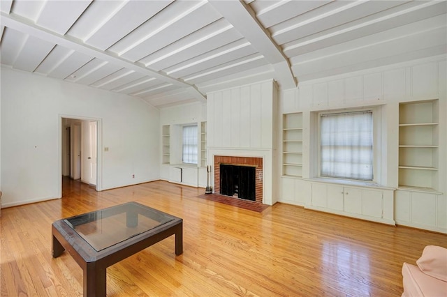 520 Linda Vista Ave, Pasadena, CA 91105 - unfurnished living room featuring built in features, wood finished floors, beamed ceiling, baseboards, and a fireplace