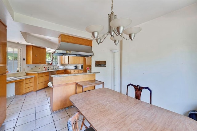 520 Linda Vista Ave, Pasadena, CA 91105 - dining room featuring light tile patterned flooring, a chandelier, and a raised ceiling