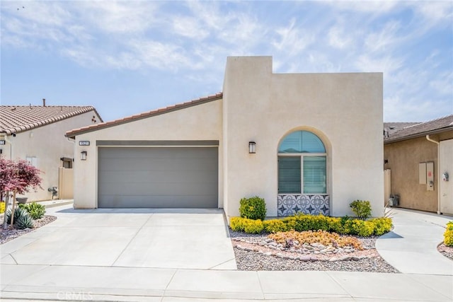 1521 Summerfield Way, Beaumont, CA 92223 - view of front facade with an attached garage, stucco siding, and driveway