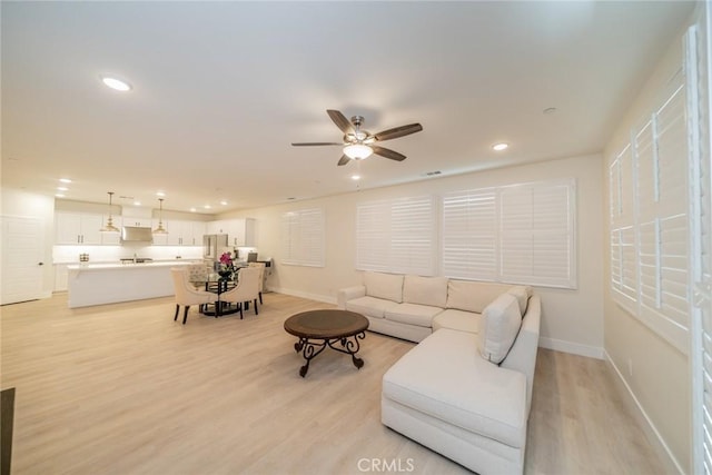 1521 Summerfield Way, Beaumont, CA 92223 - living room with a ceiling fan, light wood-type flooring, recessed lighting, and baseboards