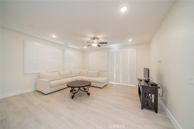 1521 Summerfield Way, Beaumont, CA 92223 - living area with ceiling fan, baseboards, wood finished floors, and recessed lighting