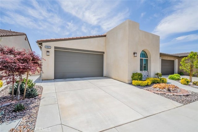 1521 Summerfield Way, Beaumont, CA 92223 - view of front of home featuring an attached garage, concrete driveway, and stucco siding