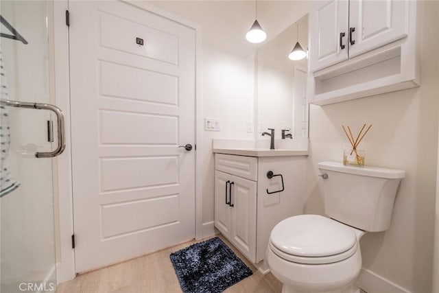 1521 Summerfield Way, Beaumont, CA 92223 - full bath with baseboards, vanity, toilet, and a shower with door