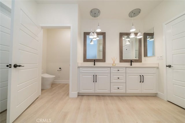 1521 Summerfield Way, Beaumont, CA 92223 - bathroom featuring wood finished floors and double vanity