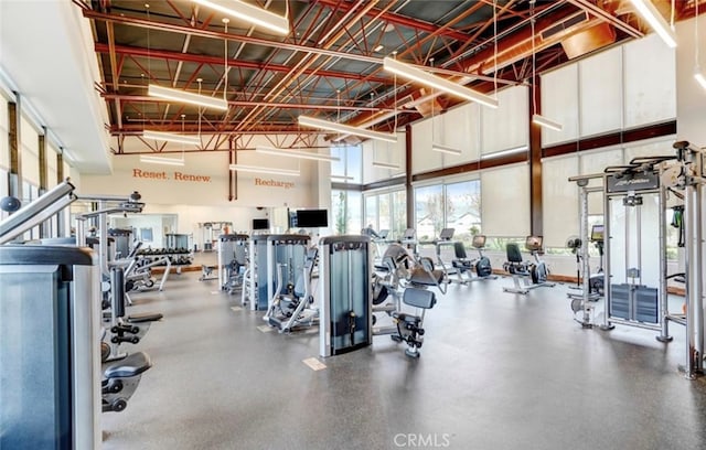 1521 Summerfield Way, Beaumont, CA 92223 - workout area featuring a towering ceiling and plenty of natural light