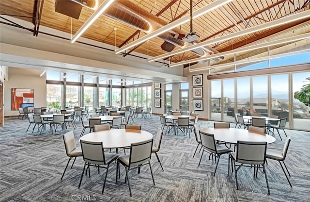 1521 Summerfield Way, Beaumont, CA 92223 - carpeted dining room with a towering ceiling, healthy amount of natural light, and a mountain view