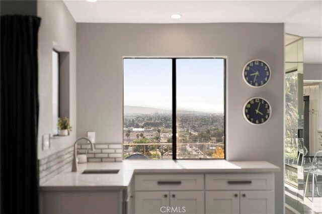 1995 Molino Ave Unit 301, Signal Hill, CA 90755 - kitchen with a sink, healthy amount of natural light, and light countertops