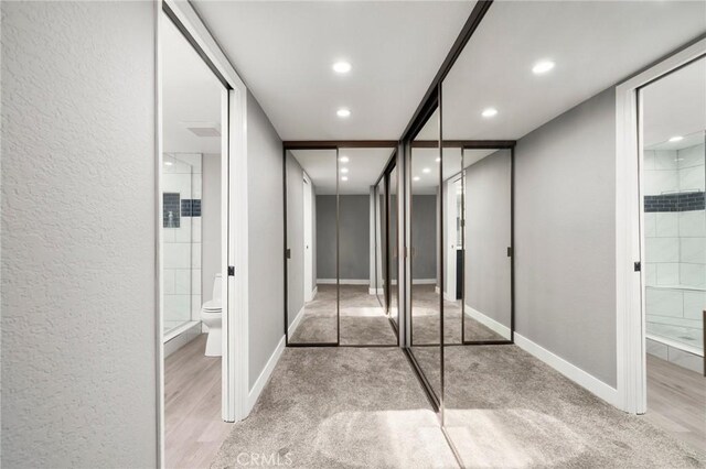 1995 Molino Ave Unit 301, Signal Hill, CA 90755 - interior space with toilet, tiled shower, recessed lighting, a textured wall, and baseboards