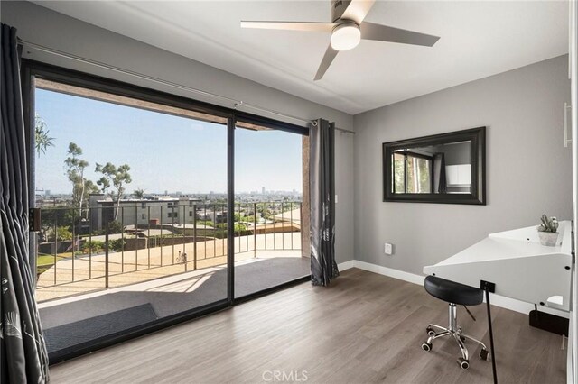 1995 Molino Ave Unit 301, Signal Hill, CA 90755 - office area with baseboards, wood finished floors, and a ceiling fan