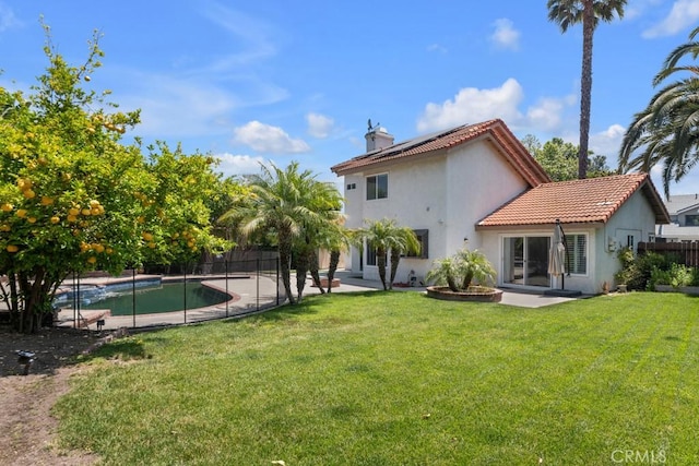 575 Nicole Dr, Newbury Park, CA 91320 - rear view of property with a patio, stucco siding, a tile roof, and solar panels