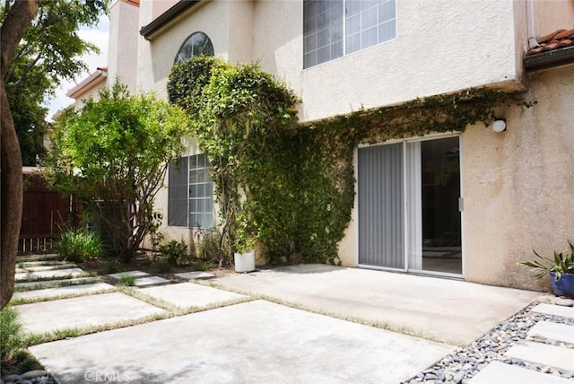 14678 Tupper St, Panorama City, CA 91402 - back of property featuring a patio area and stucco siding
