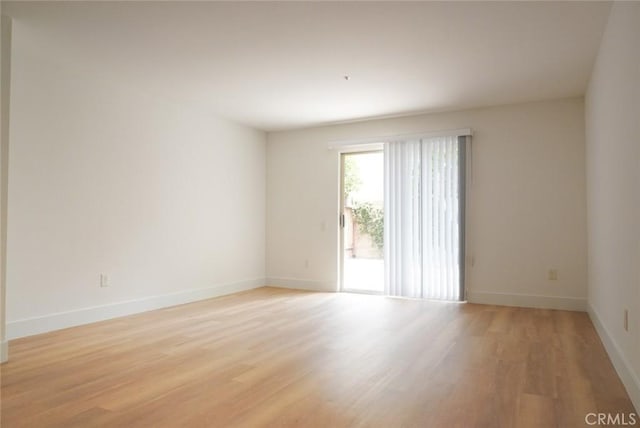 14678 Tupper St, Panorama City, CA 91402 - unfurnished room featuring light wood-style flooring and baseboards