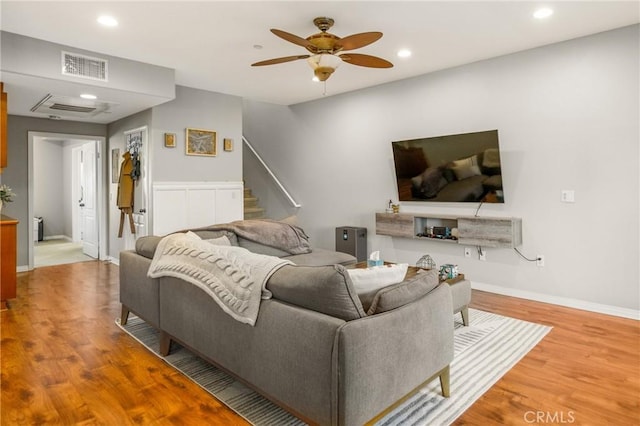 17230 Newhope St Unit 309, Fountain Valley, CA 92708 - living room with ceiling fan, recessed lighting, wood finished floors, stairs, and baseboards