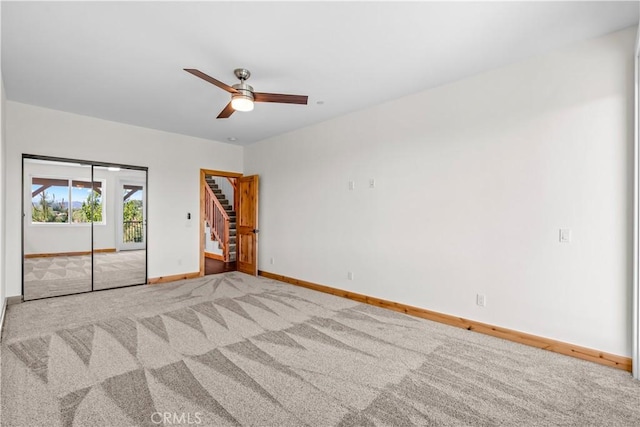 851 Madera Ln, Lake Arrowhead, CA 92352 - unfurnished bedroom with carpet, baseboards, access to outside, and ceiling fan
