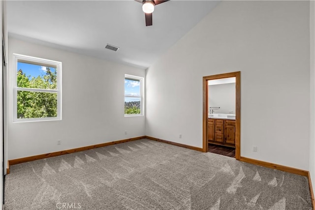 851 Madera Ln, Lake Arrowhead, CA 92352 - spare room with plenty of natural light, carpet floors, baseboards, a ceiling fan, and vaulted ceiling