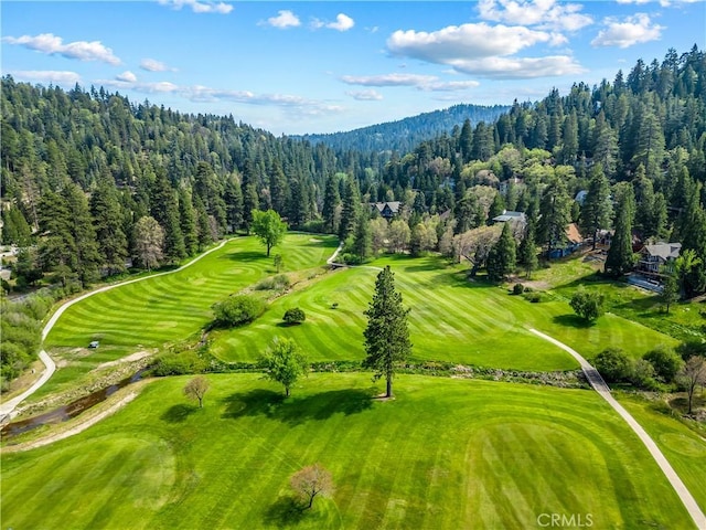 851 Madera Ln, Lake Arrowhead, CA 92352 - bird's eye view of a forest, a golf club, and a mountain backdrop