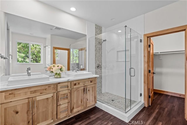 851 Madera Ln, Lake Arrowhead, CA 92352 - bathroom with a shower stall, wood finished floors, double vanity, and recessed lighting
