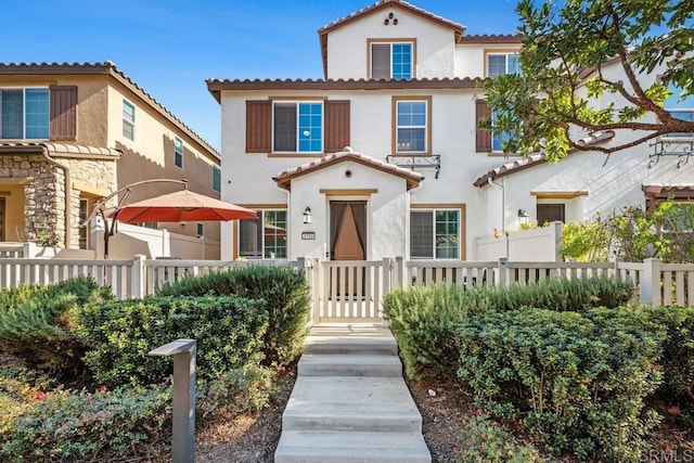 1710 Moon Orchid Ave, Chula Vista, CA 91913 - mediterranean / spanish-style house featuring stucco siding and a tile roof