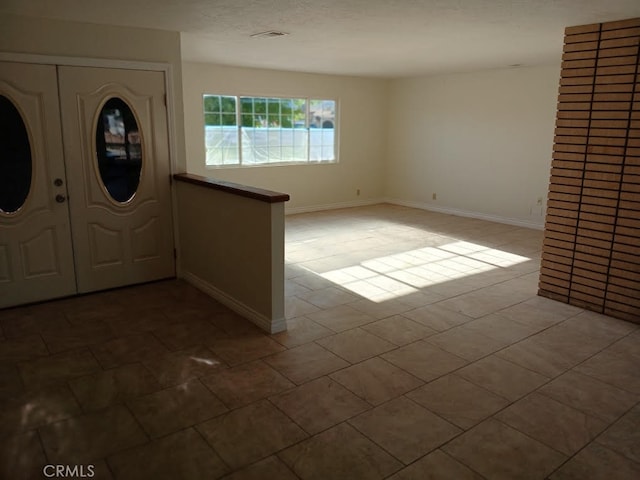 15615 Apache Rd, Apple Valley, CA 92307 - tiled entryway featuring baseboards