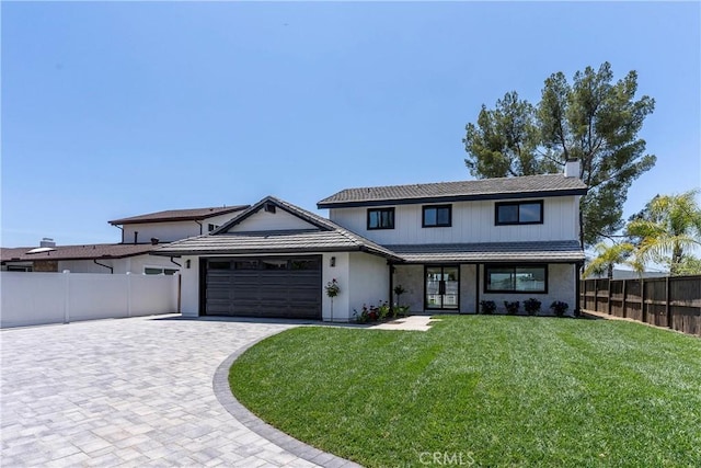 26050 Farmfield Rd, Calabasas, CA 91302 - traditional home featuring a chimney, a garage, and decorative driveway