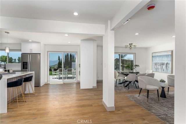 26050 Farmfield Rd, Calabasas, CA 91302 - living area featuring light wood-style flooring, recessed lighting, and baseboards