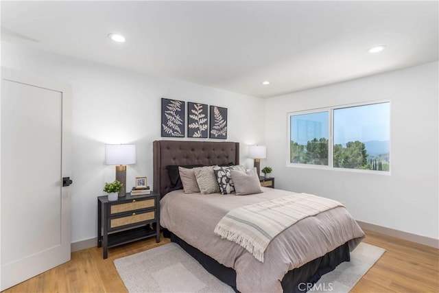 26050 Farmfield Rd, Calabasas, CA 91302 - bedroom with light wood-style floors, baseboards, and recessed lighting
