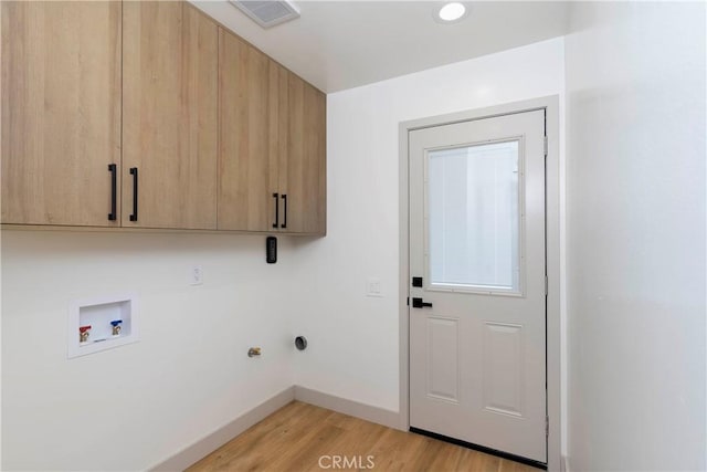 26050 Farmfield Rd, Calabasas, CA 91302 - laundry room featuring cabinet space, washer hookup, light wood-type flooring, and baseboards